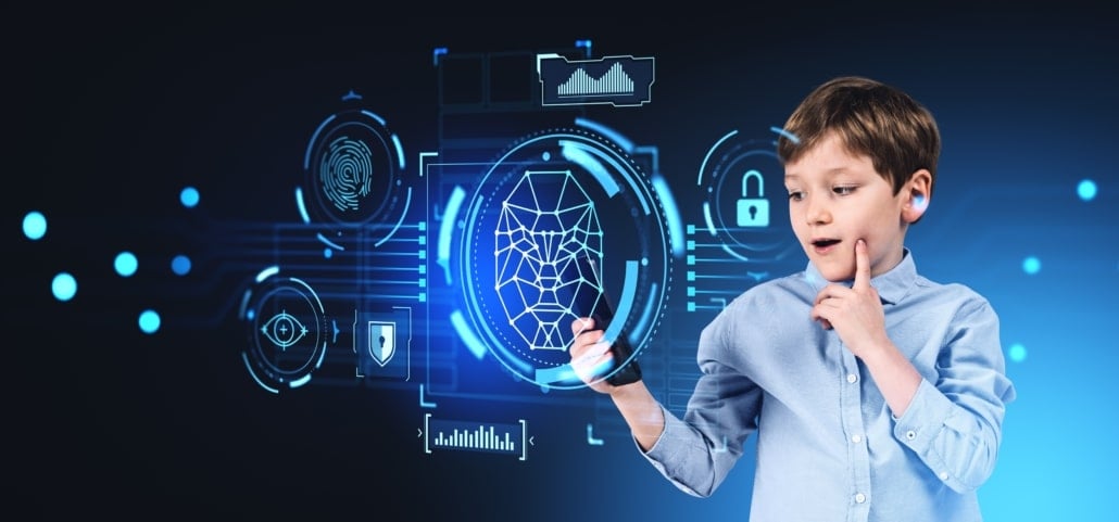Portrait,Of,Surprised,Boy,Using,Smartphone,With,Facial,Recognition,Interface