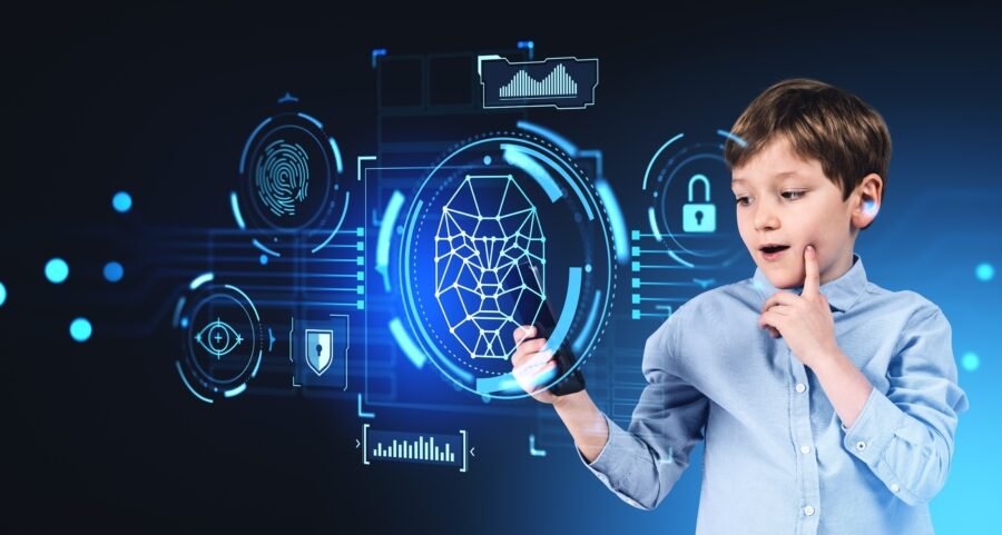 Portrait,Of,Surprised,Boy,Using,Smartphone,With,Facial,Recognition,Interface