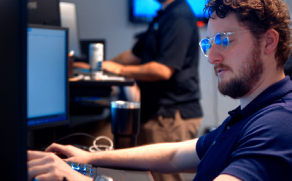 i-tech employee working on computer
